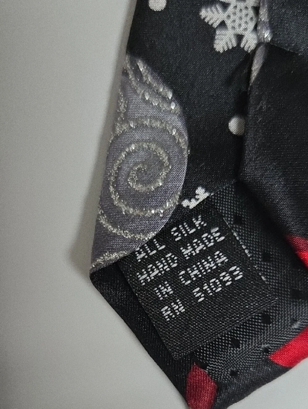 Black Holiday Tie with Red and Silver Ornament Motif
